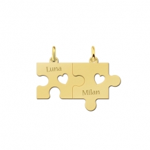 Koppel hanger puzzle met open harten goud